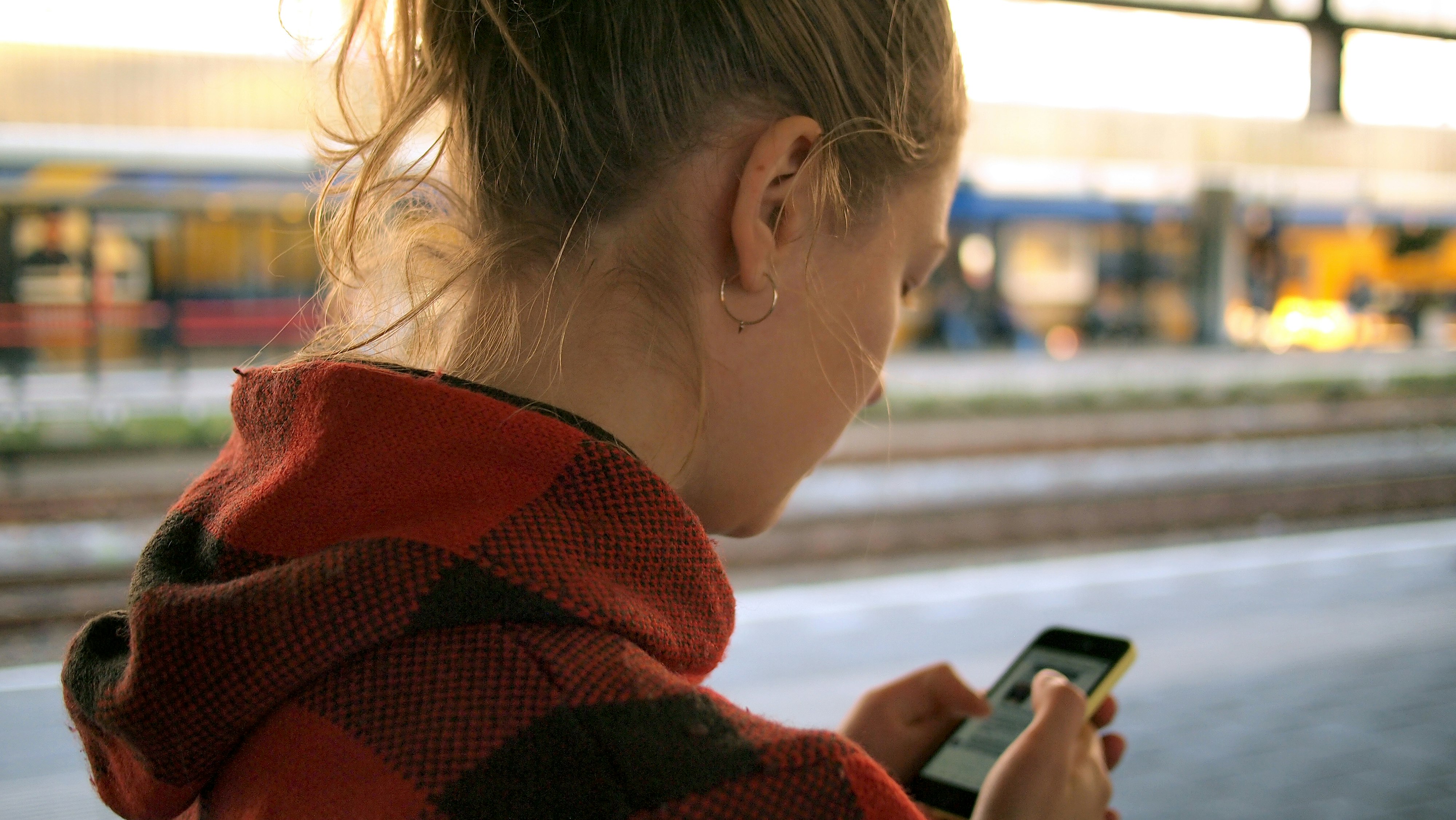 woman holding phone